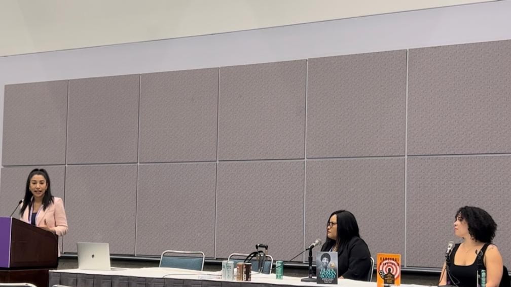 From Research to Recognition: Cultivating Public Visibility as an Academic Nanda Dyssou, Professor Donna J. Nicol, and Professor Brittany Friedman speaking as panelists during the AWP 2025 workshop ‘From Research to Recognition: Cultivating Public Visibility as an Academic’ at the Los Angeles Convention Center.